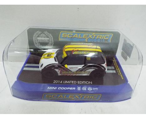 NSCC Scalextric - Slot Car in 1:32 scale. # C3499 Team Mini Cooper. Limited Edition 56 of 60. Vehicle appears mint in perspex