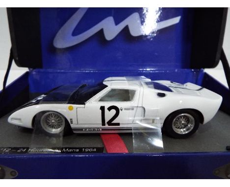 Le Mans - Slot Car in 1:32 Scale - Ford GT 40 no. 12 - 24. Drivers - Attwood / Schiesser. Appears mint in presentation case, 