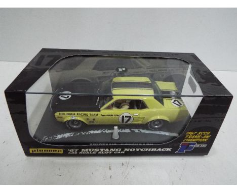 Pioneer - Slot Car in 1:32 Scale - Ref. P009. '67 Mustang Notchback Jerry Titus. Appears mint in presentation case, with ligh