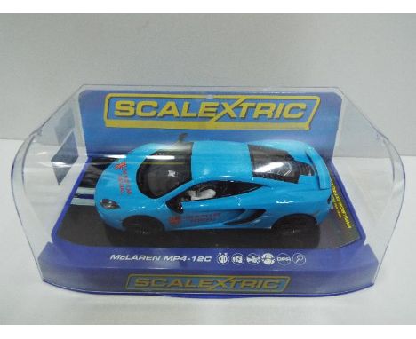 Scalextric - Limited Editon 160 of 200. Slot Car model in 1:32 Scale - # C3330 McLaren MP4-12C. U.K. Slot car festival. Appea