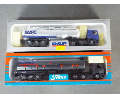 Tekno - 2 x boxed 1:50 scale DAF tanker trucks, one in grey in a Tekno livery box and one in blue and silver in a DAF box. Bo