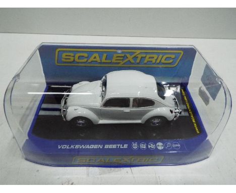 Scalextric - U.S.A. Slot Car in 1:32 scale. # 3362 VW Beetle, Peking - Paris . Vehicle appears mint in perspex presentation c