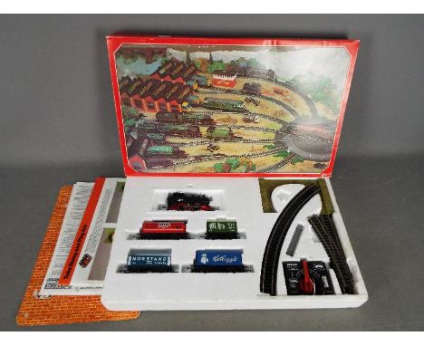 Hornby - A boxed # R873-9130 00 gauge electric train set with an 0-4-0 tank engine, 4 x wagons, a bridge and some track. It i