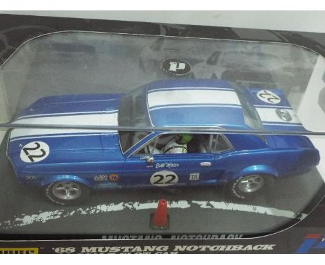 Pioneer - Slot Car in 1:32 Scale - Ref. P010. '68 Mustang Notchback. Appears mint in presentation case, with storage wear to 