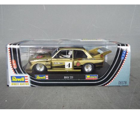 Revell - Slot Car in 1:32 scale. # 08378 BMW 320 DRM 1977 Jorg Obermoser. Vehicle appears mint in perspex presentation case. 