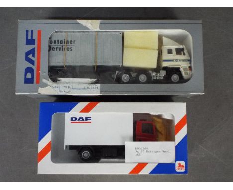 Tekno - Lion - Toys 2 x boxed 1:50 scale Leyland DAF trucks, the white truck has lost its passenger side mirror. They appear 