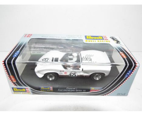 Revell - Slot Car in 1:32 scale. # 08348 Chapparral 2 Road America June Sprints 65. Vehicle appears mint in perspex presentat