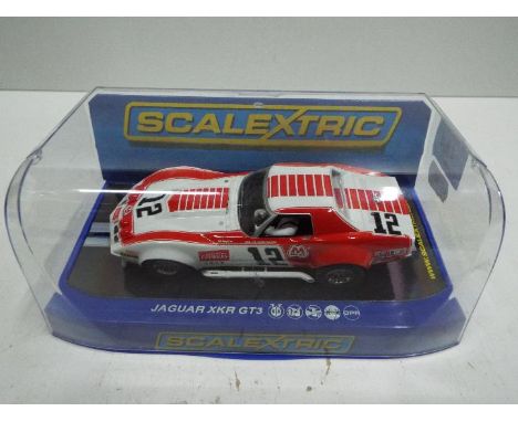 Scalextric - Slot Car in 1:32 scale. # Chevrolet Corvette race car. Vehicle appears mint in an incorrect perspex presentation