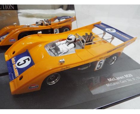 Carrera - Slot Car in 1:32 Scale - # 27328 Evolution McLaren M20 No. 5 1972. Appears mint in presentation case, with storage 