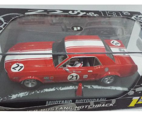 Pioneer - Slot Car in 1:32 Scale - Ref. P012. '68 Mustang Notchback. Appears mint in presentation case, with storage wear to 