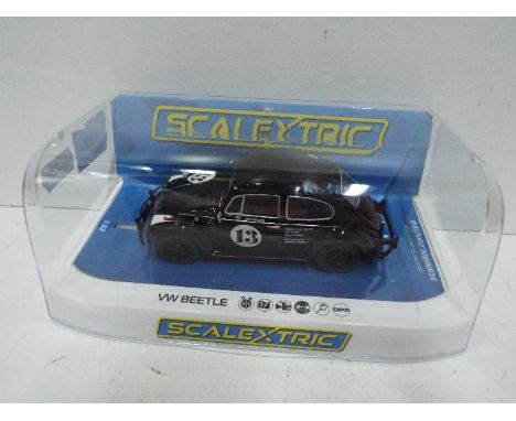 Scalextric - Slot Car in 1:32 scale. # C4147 VW Beetle. Vehicle appears mint in perspex presentation case. Light storage wear