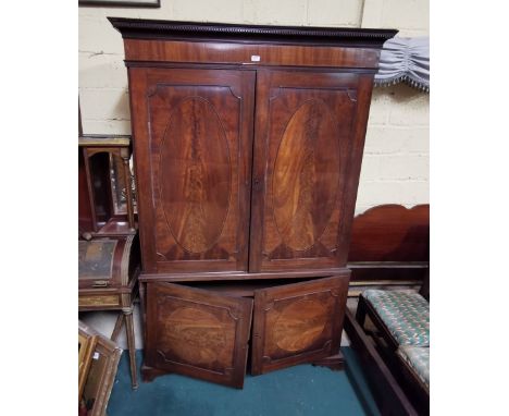 Georgian Mahogany Linen Press, a moulded cornice over 2 upper doors inlaid with oval panels and opening to a hanging rail, ab