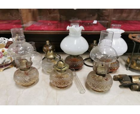 6 moulded glass Vintage oil lamp bowls, 2 with shades &amp; 2 brass lamp burners &amp; a brass lamp bowl holder with bracket 