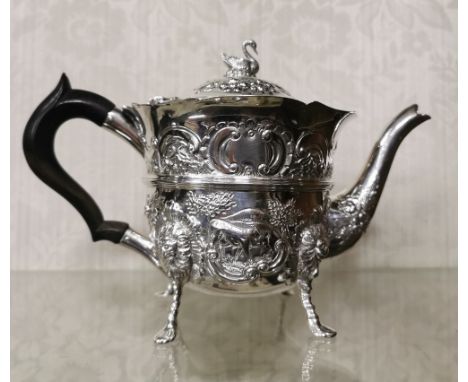 Irish Silver Teapot, by Charles Lamb, 1901, 505 gram weight (incl. Ebony handle), a swan mounted lid over the pot embossed wi