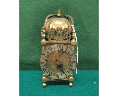Brass cased Carriage Style Clock, winding mechanism, featuring dragons on top and starfish panels, silvered dial, Pat's U.S.A