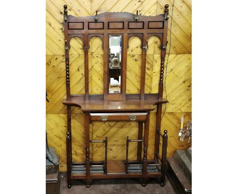 Tall Edw. Walnut Hall Stand, a narrow bevelled mirror fitted to the back, 7 brass hanging hooks, drawer to base, wide stick s