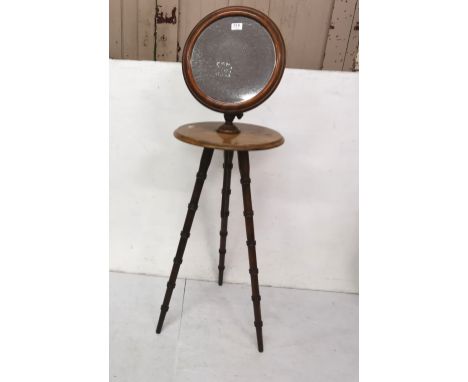Georgian mahogany Gent’s Wash Stand, a pivoting mirror over a round shelf, on 3 bamboo style legs, 170cm h