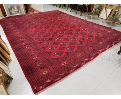 Large Handwoven Red Ground Iranian Carpet, with an all-over Bokhara Pattern, 3.8 x 3m