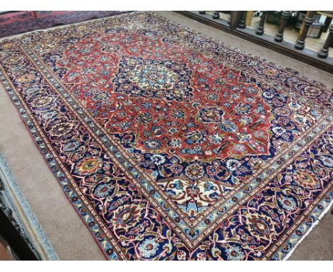 Red ground Kashan Carpet, fine woven city carpet, traditional medallion design, 3.45m x 2.30m
