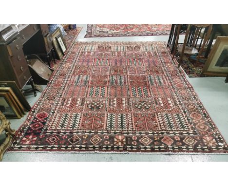 Full pile Persian Bokhara Carpet, with a traditional fine style Persian panel design, muted browns, light red colours, 2.95m 