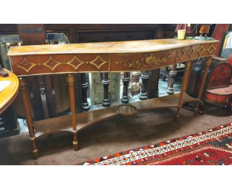 Early 20thC Burr Walnut Slender Console Table, a serpentine shaped top featuring star shaped and gilded mouldings, over one a
