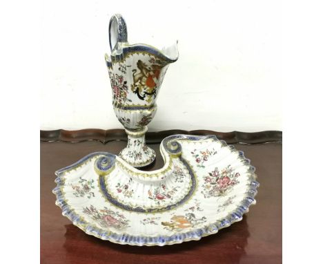 19thC French Ewer and scallop shaped Basin, both featuring an armorial crest with horse and lion and pink floral decor throug
