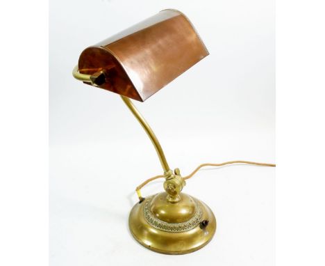 An early 20th century copper and brass students desk lamp 