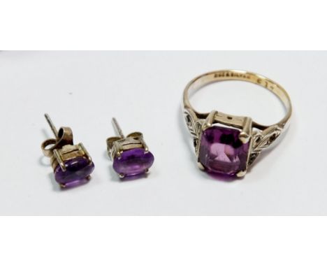 A 9 carat gold and silver amethyst ring, size O/P and a pair of matching earrings 