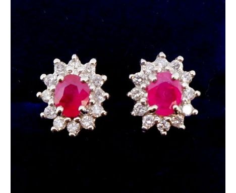 A pair of 18 carat gold ruby and diamond cluster earrings , 9mm x 7mm 