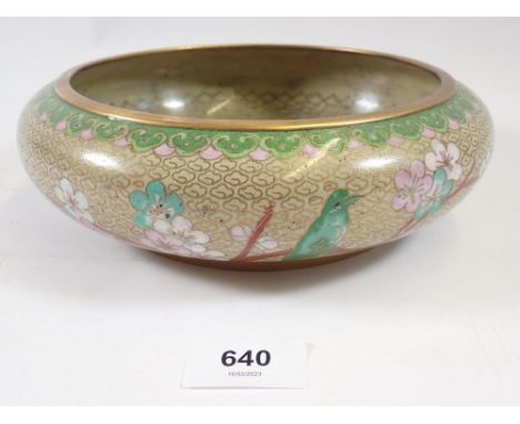 A small oriental cloisonne enamel bowl in pink and green, 21cm diameter