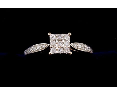 A 9 carat white gold ring set square panel of nine diamonds on diamond set shoulder, size J 