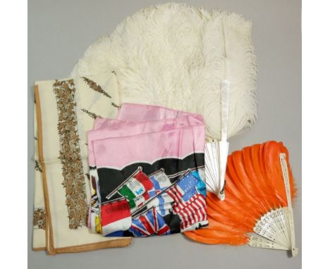 An ostrich feather and mother of pearl fan, an orange feather and bone fan and two scarves 