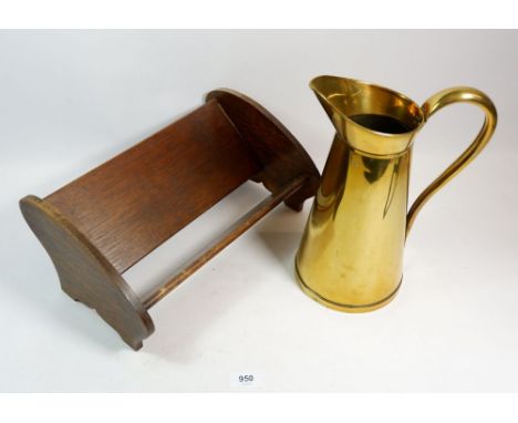 An oak book trough and a copper jug