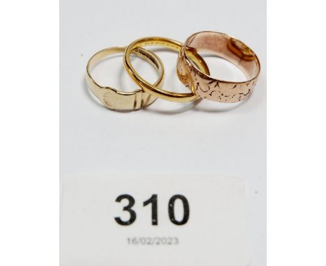 A 22 carat gold wedding ring, 3.4g and two 9 carat gold rings, 5.3g 