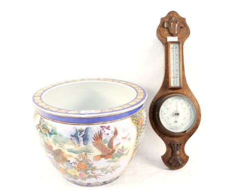 An oval chinoiserie wall mirror, oak barometer (cracked glass), two Mary Bannister watercolours plus a Chinese polychrome bir