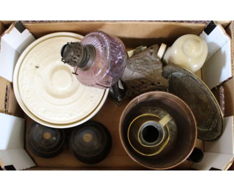 An oil lamp, lawn bowls etc