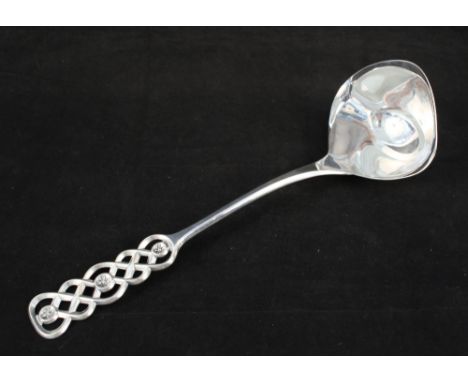 An 830S silver 12" gravy ladle by the illustrious Norwegian silversmith David Andersen in the Ringebu pattern, c1950's