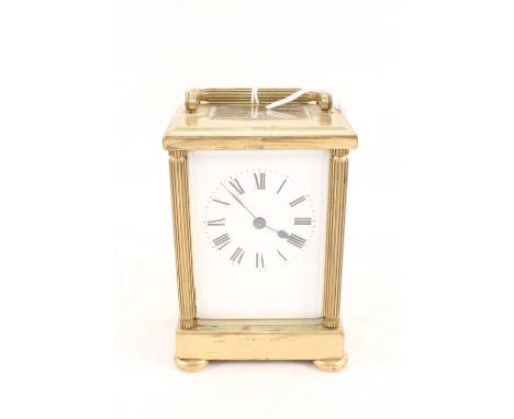 A brass cased carriage clock