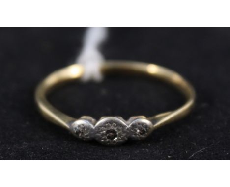 An 18ct platinum three diamond ring, size S