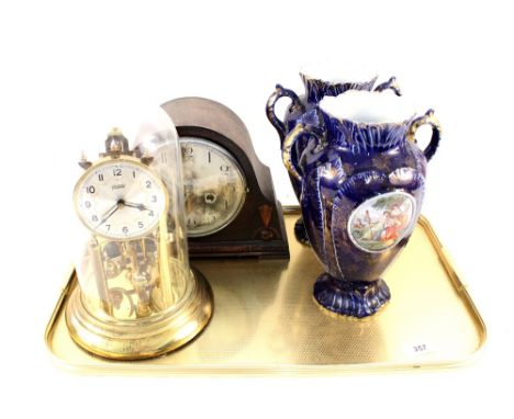 An oak mantel clock, dome clock plus a pair of Victorian vases