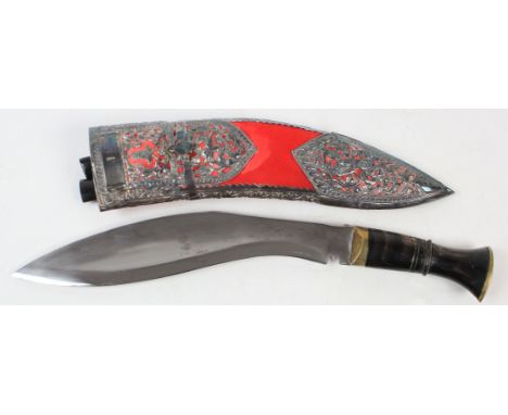 Kukri knife, a superb quality piece with silver mounts to scabbard, engraved with the letter 'J'.