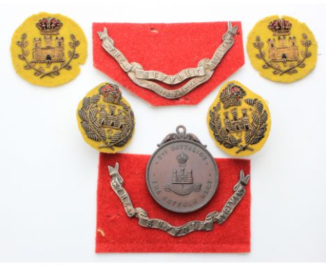 Suffolk's - mixed lot of 4 gilt wire & cloth badge.  2 silver scrolls one for the 1st Vol. Battn.  & 1 for the Suffolk Regt. 