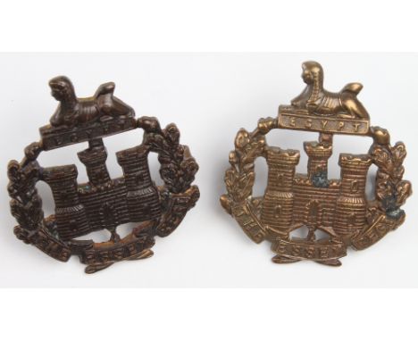 Essex Regt.,  2  x Officer's   bronze Hat badges , 1 with 2 lugs and 1 with 2 crimped fold over lugs.  Both have the small du