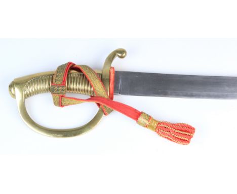 Sword: An Indian (?) copy of a 19th century French Briquet sidearm in its brass mounted leather scabbard. Brass ribbed stirru