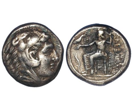 Ancient Greek silver tetradrachm of the Macedonian Kingdom of Alexander III the Great, legs of seated Zeus not crossed, a lit