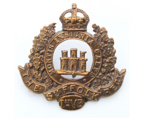 Suffolk's - O/R , K.C. bronze 1st. V.B. Hat badge - has no Gibraltar Scroll and has 2 lugs to the reverse. 