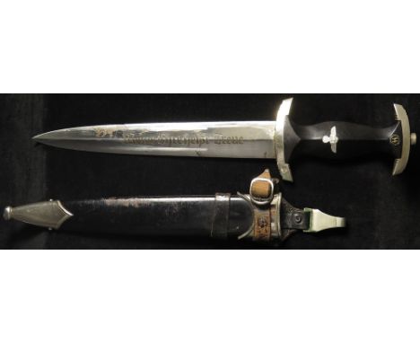 German WW2 SS Dagger with scabbard and leather strap. Blade maker marked 'RZM 1052/38 SS'.  Strap marked 'DRGM'.   A super pi