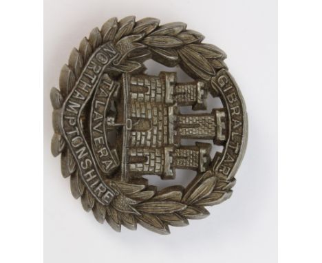 Northamptonshire Regt. original WW2 plastic Economy badge. Has 2 fold-over lugs and is slightly bent. 