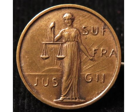 Suffragette American bronze badge.  Front reads "Suffra" "jus G11".  Front marked with maker which ends with "dan".   Back ma