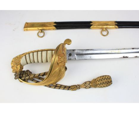 Sword: A very good 1827 Pattern Naval Officers sword. S.E. fullered blade 31" etched with Victoria's Crown & Anchor motif. Fi